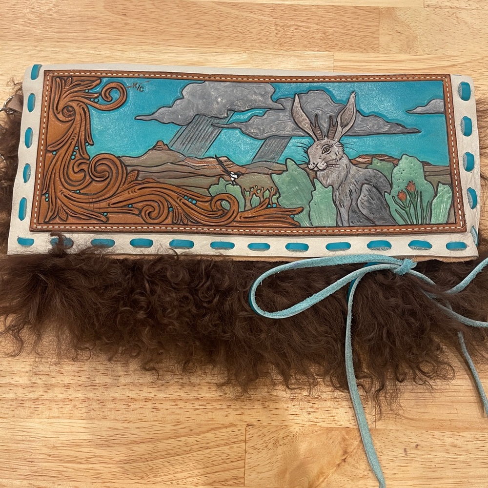 Handmade tooled clutch magpie west ( formerly known as k bar c)